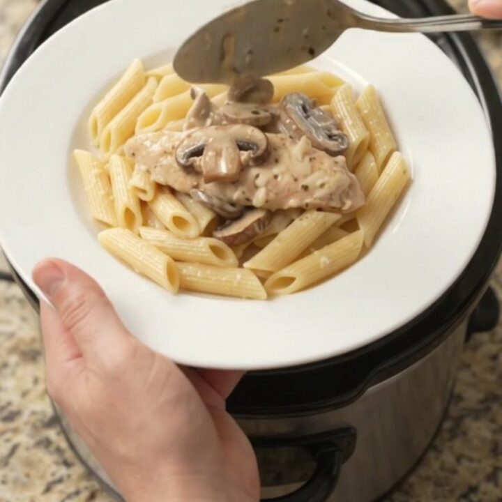Slow cooker chicken tenders with mushrooms and mozzarella in a creamy sauce.