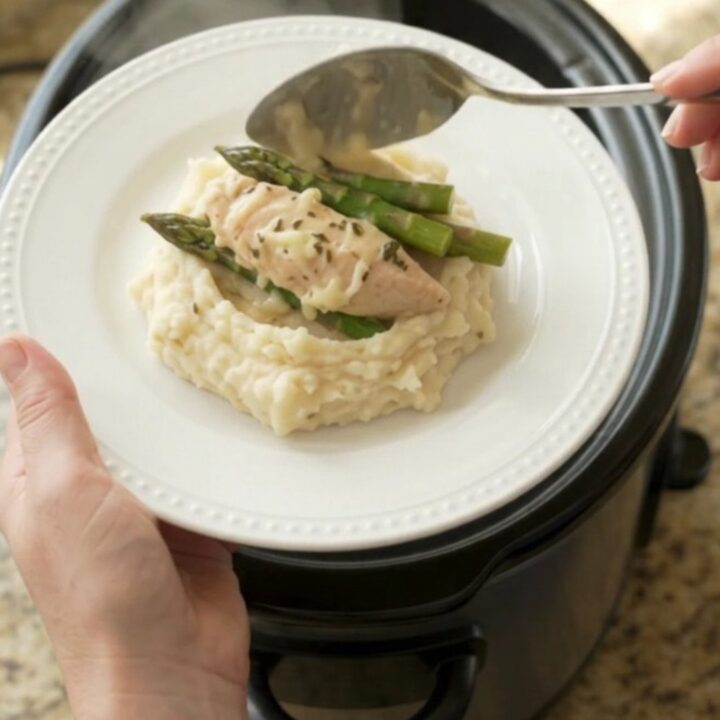 Slow cooker chicken and asparagus in creamy Swiss sauce