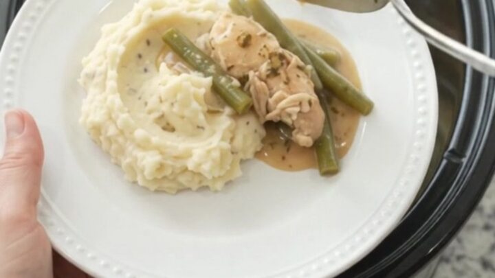 Slow cooker chicken tenders and green beans in a creamy Swiss sauce