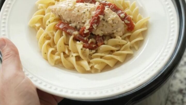 Slow cooker chicken tenders in creamy Parmesan sauce with sun-dried tomatoes