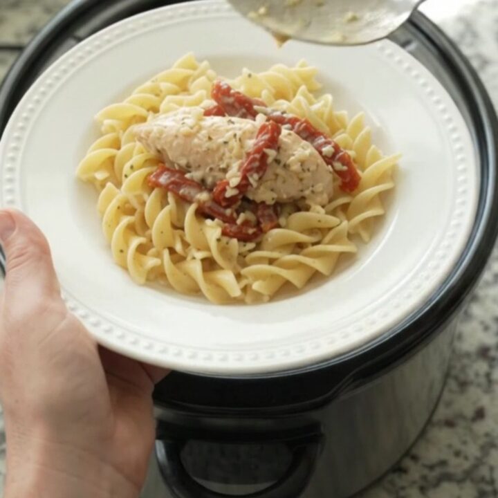 Slow cooker chicken tenders in creamy Parmesan sauce with sun-dried tomatoes