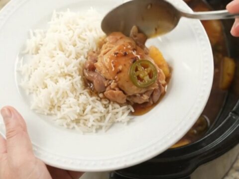 Slow cooker chicken thighs with pineapple and jalapeños in a sticky honey-soy glaze