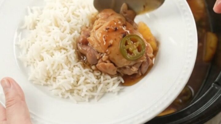 Slow cooker chicken thighs with pineapple and jalapeños in a sticky honey-soy glaze