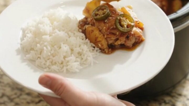 Caramelized teriyaki chicken thighs with pineapple and jalapeño in a slow cooker