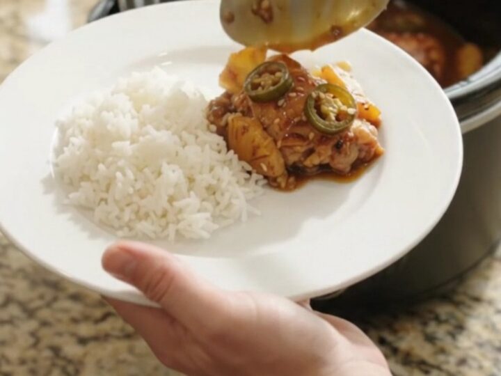 Caramelized teriyaki chicken thighs with pineapple and jalapeño in a slow cooker