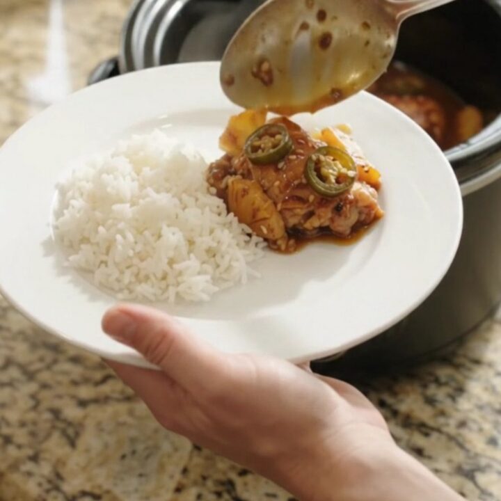 Caramelized teriyaki chicken thighs with pineapple and jalapeño in a slow cooker