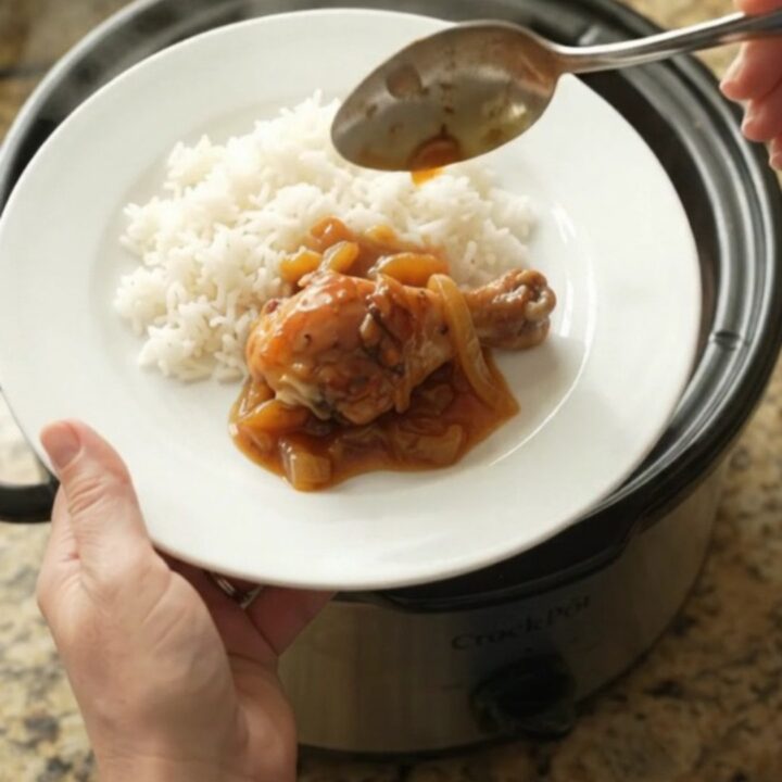 Glazed chicken drumsticks in a slow cooker with apricot and BBQ sauce