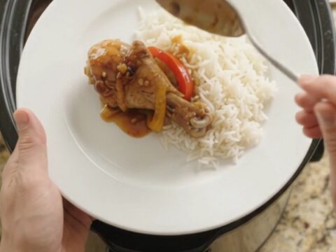 Slow-cooker honey soy chicken drumsticks with bell peppers in a glossy amber glaze