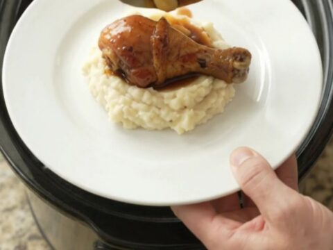 Slow cooker bourbon glazed chicken drumsticks with garlic and scallions