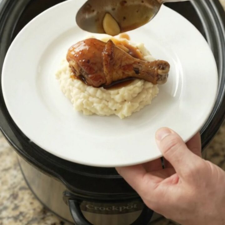 Slow cooker bourbon glazed chicken drumsticks with garlic and scallions