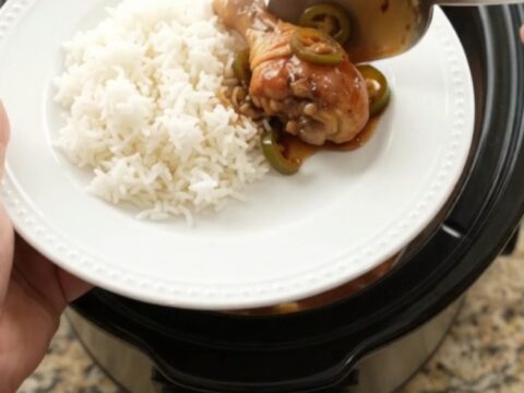 Glazed chicken drumsticks with pineapple and jalapeño in a slow cooker