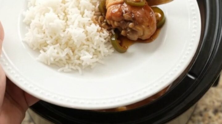 Glazed chicken drumsticks with pineapple and jalapeño in a slow cooker