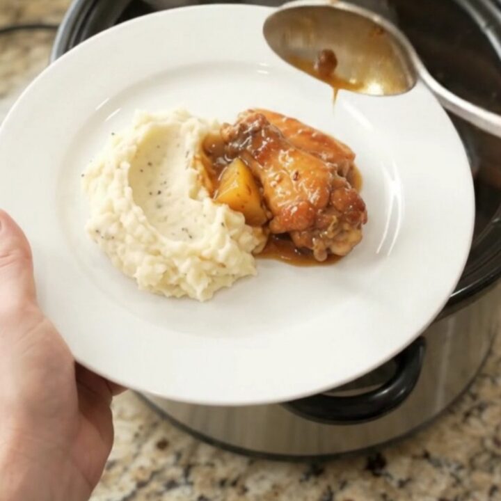 Sticky pineapple bourbon BBQ chicken wings in a slow cooker, glazed and caramelized