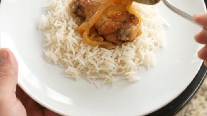 Sticky apricot honey soy chicken wings in a slow cooker with glossy glaze and steam rising