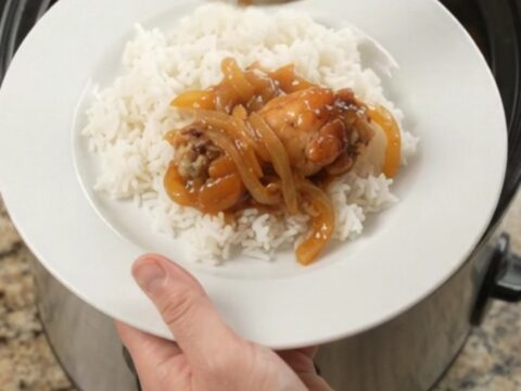 Sticky apricot teriyaki chicken wings in a slow cooker, glazed and glossy