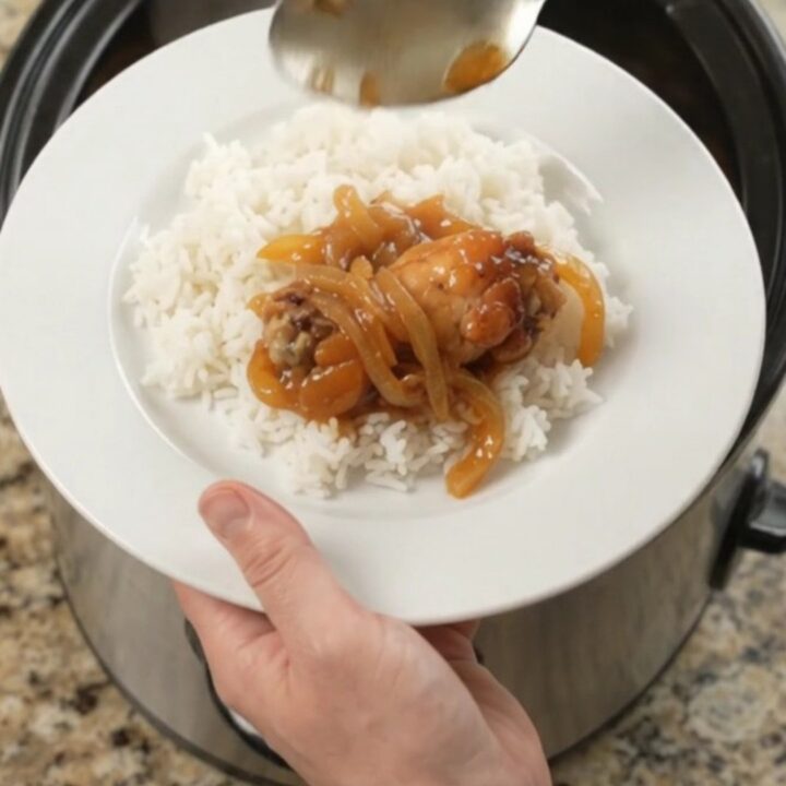 Sticky apricot teriyaki chicken wings in a slow cooker, glazed and glossy