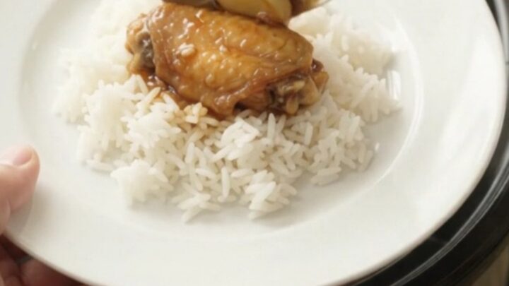 Slow-cooker teriyaki chicken wings with garlic and scallions in a glossy glaze.