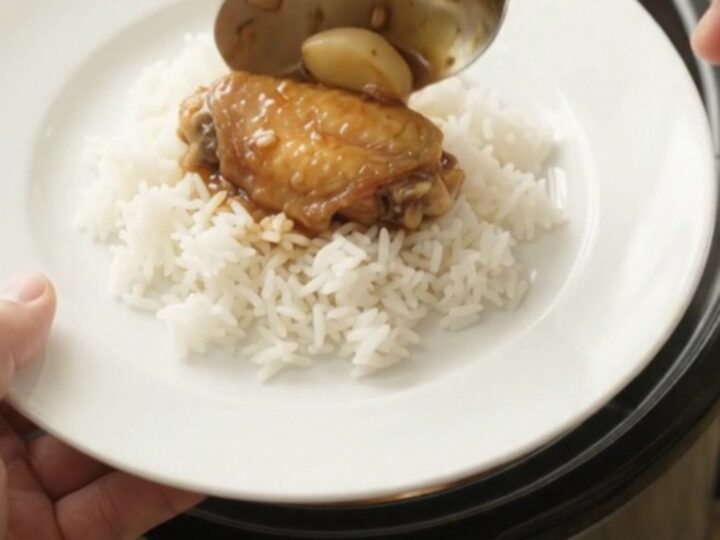Slow-cooker teriyaki chicken wings with garlic and scallions in a glossy glaze.