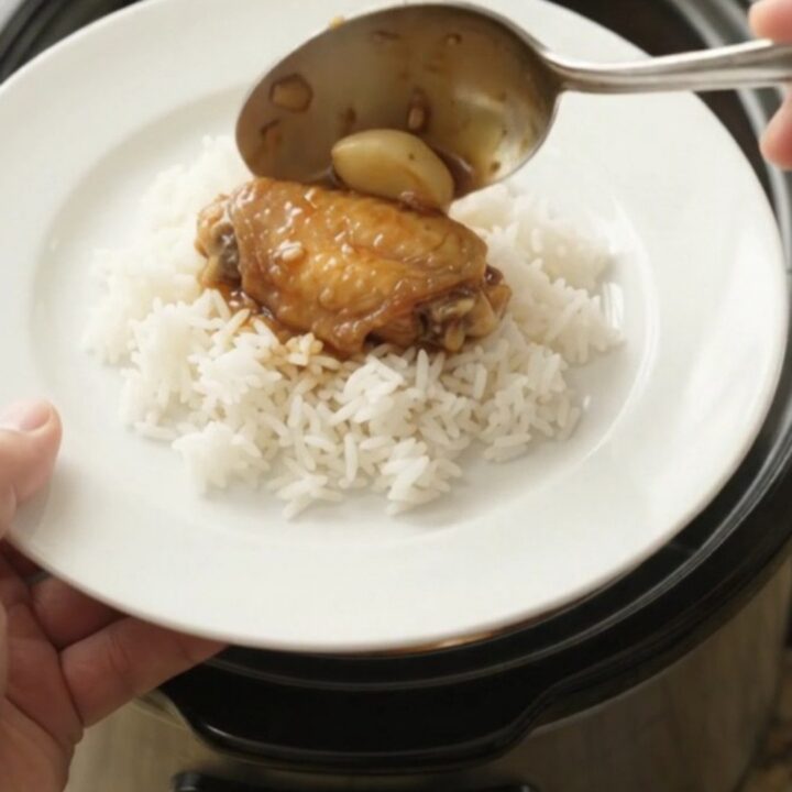 Slow-cooker teriyaki chicken wings with garlic and scallions in a glossy glaze.