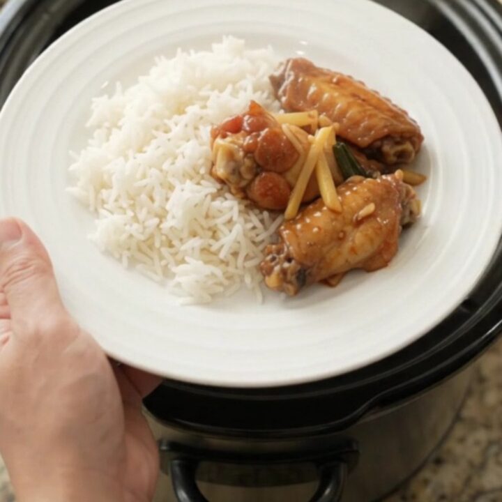 Sticky honey soy chicken wings in a slow cooker with ginger and scallions