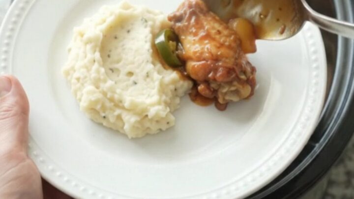 Sticky bourbon glazed chicken wings in a slow cooker with pineapple and jalapeños