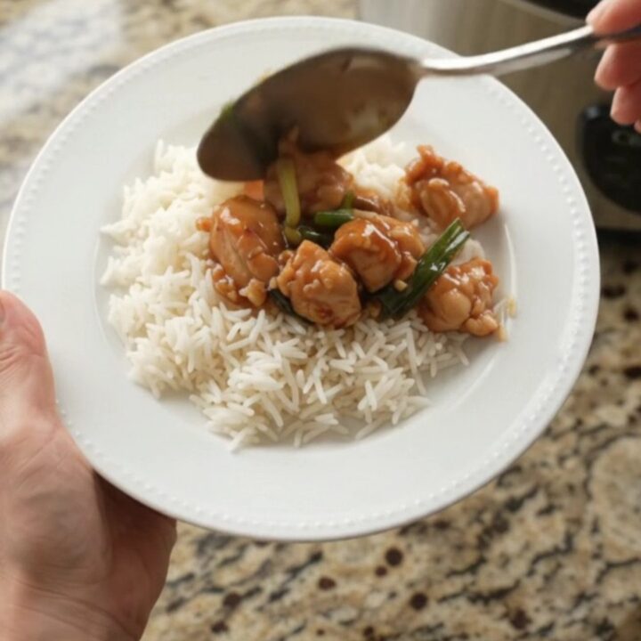 Glazed chicken bites with ginger and scallions in a slow cooker