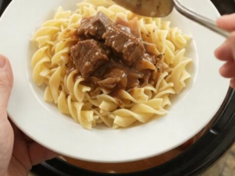 Sour Cream Pepper Beef Bites in a slow cooker, with tender beef and peppers in a creamy gravy