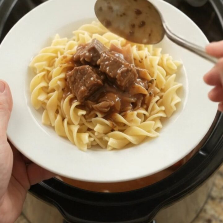 Sour Cream Pepper Beef Bites in a slow cooker, with tender beef and peppers in a creamy gravy