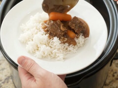 Slow cooker beef with carrots and potatoes in bourbon gravy