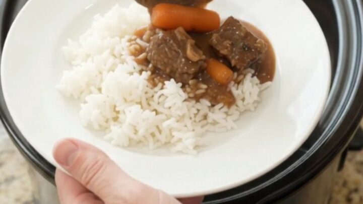 Slow cooker beef with carrots and potatoes in bourbon gravy