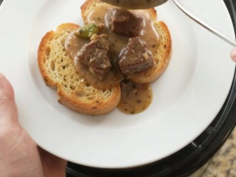 Slow cooker beef and asparagus in creamy Gruyère sauce, served on brioche