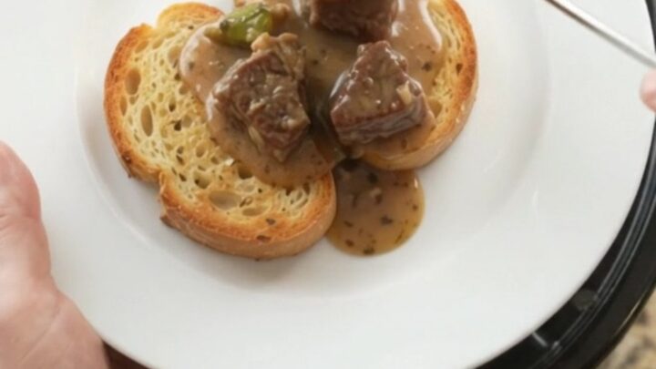 Slow cooker beef and asparagus in creamy Gruyère sauce, served on brioche
