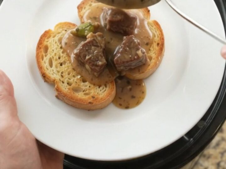 Slow cooker beef and asparagus in creamy Gruyère sauce, served on brioche