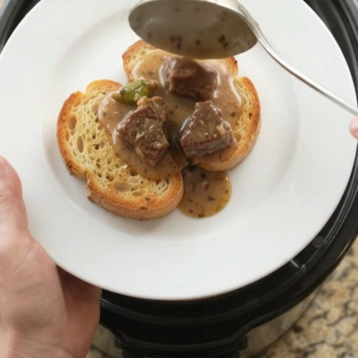 Slow cooker beef and asparagus in creamy Gruyère sauce, served on brioche