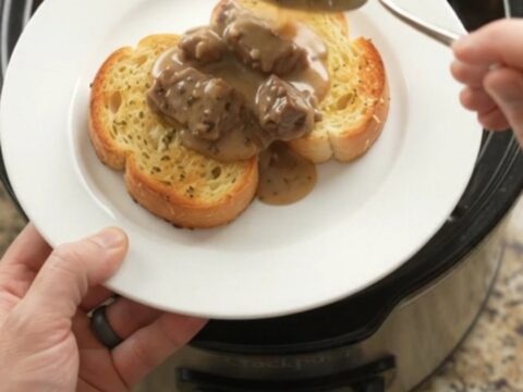 Slow cooker sirloin tips with carrots and potatoes in creamy Gruyère sauce