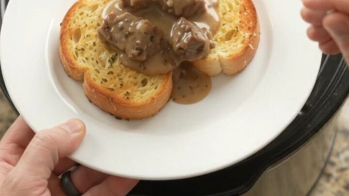 Slow cooker sirloin tips with carrots and potatoes in creamy Gruyère sauce