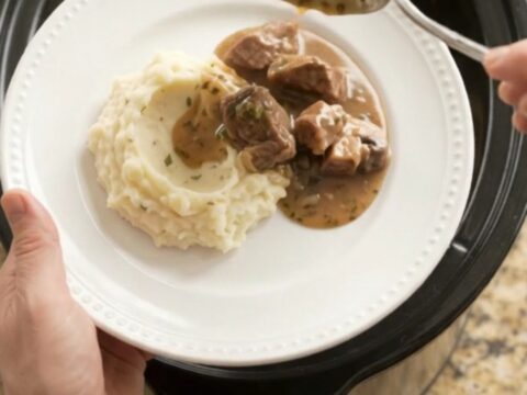 Slow cooker sirloin steak tips with broccoli and mushrooms in gravy