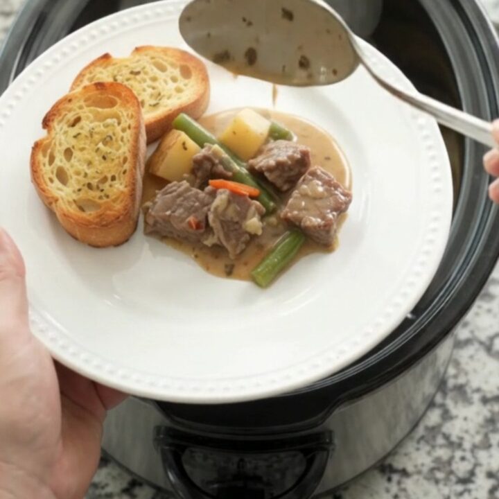 Slow cooker sirloin tips with green beans and potatoes in a creamy Gruyère sauce