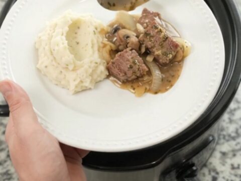Slow cooker cowboy butter ribeye bites with mushrooms and onions in a rich sauce