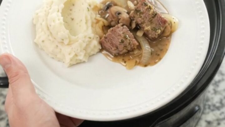 Slow cooker cowboy butter ribeye bites with mushrooms and onions in a rich sauce