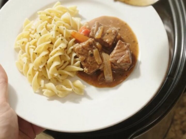 Slow cooker ribeye bites with bell peppers and onions in a rich sour cream gravy
