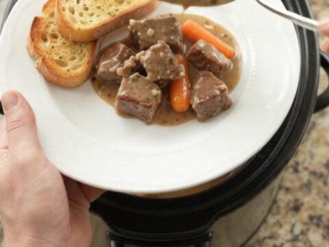 Slow cooker ribeye bites with carrots and potatoes in a creamy Gruyère sauce