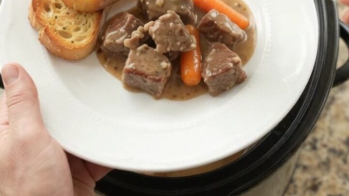 Slow cooker ribeye bites with carrots and potatoes in a creamy Gruyère sauce