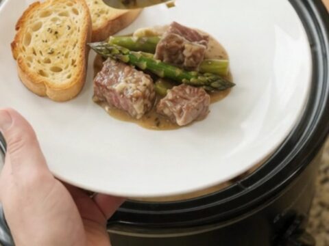 Slow cooker ribeye bites with asparagus in creamy Gruyère sauce