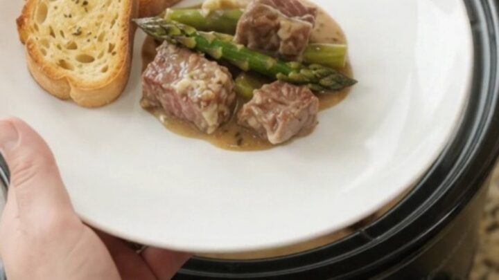 Slow cooker ribeye bites with asparagus in creamy Gruyère sauce