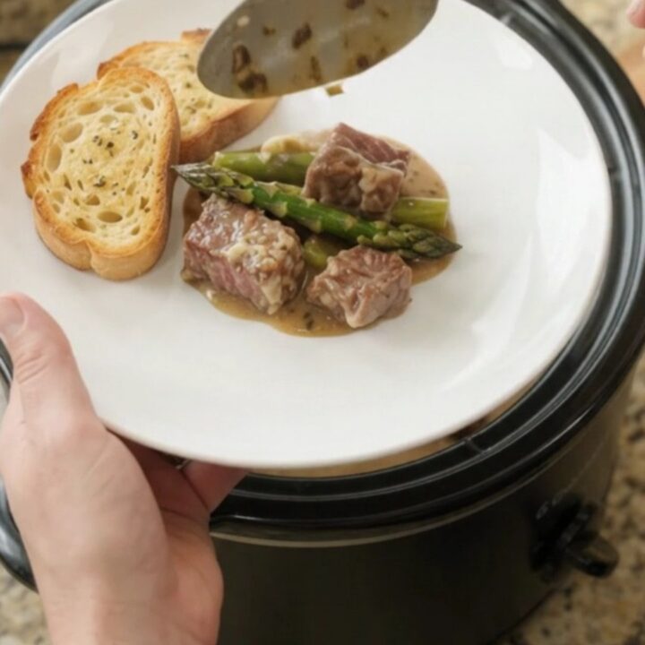 Slow cooker ribeye bites with asparagus in creamy Gruyère sauce