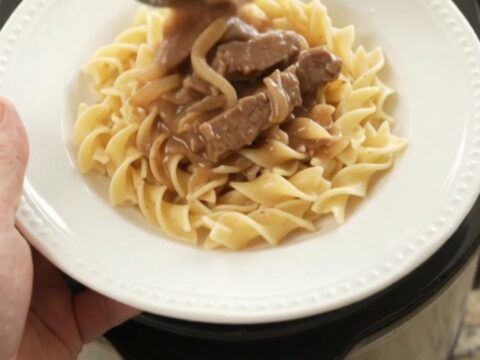 Slow cooker sour cream French onion flank steak with creamy gravy