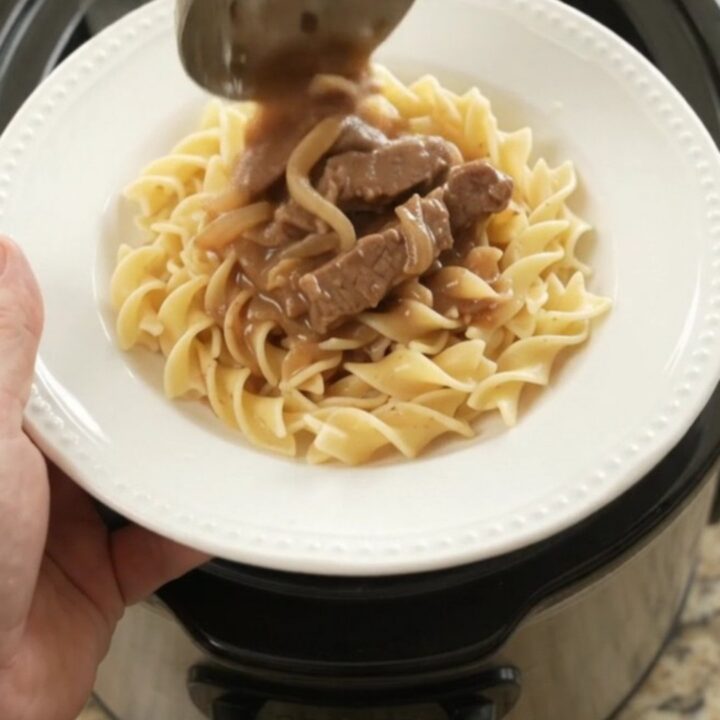 Slow cooker sour cream French onion flank steak with creamy gravy