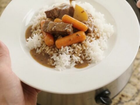 Slow-cooker flank steak with carrots and potatoes in bourbon gravy