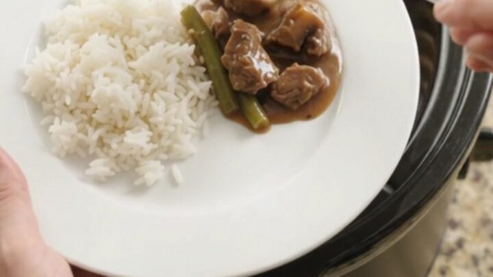 Slow cooker beef tenderloin tips with green beans and potatoes in bourbon gravy